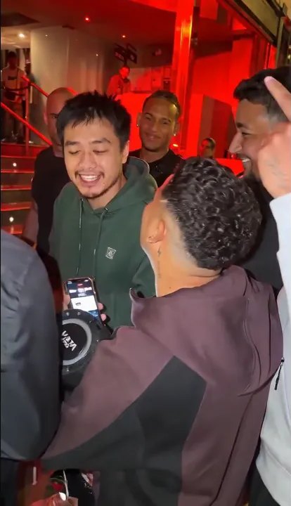 Blurred red-lit club door background